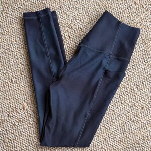 Athleta salutation stash tight